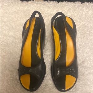 Women’s Cole Haan g Series black and yellow sling back.  Size 9